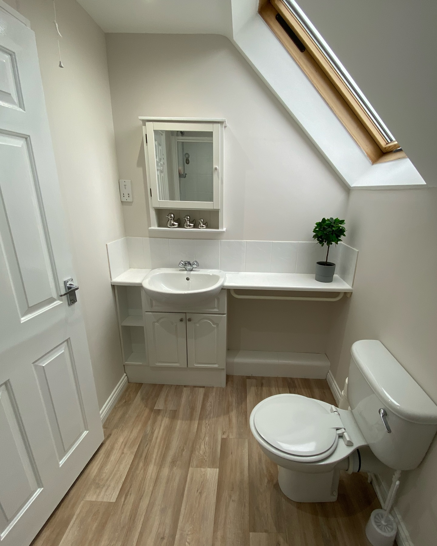 30. a Cascade Of Glass and Stone with a Suspended Bench