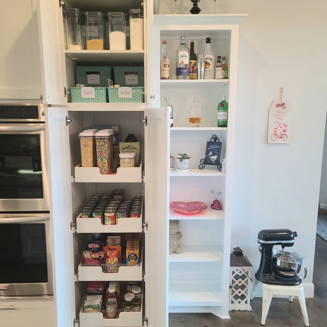 3. Floating Shelves and Wicker Baskets Create a Rustic Charm In This Compact Kitchen