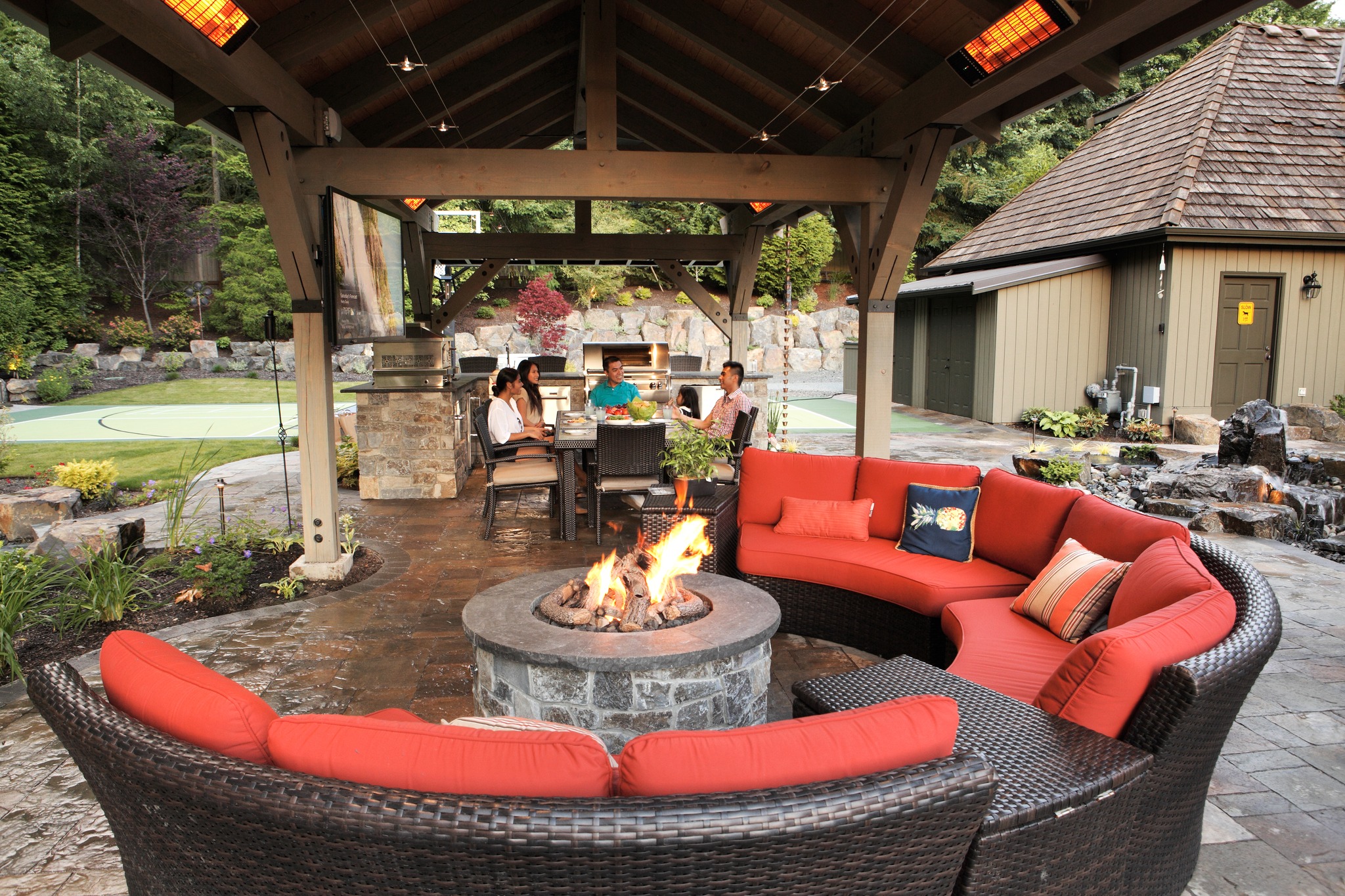 13. the Crimson Vine Canopy with Lantern Glow and Woven Seating