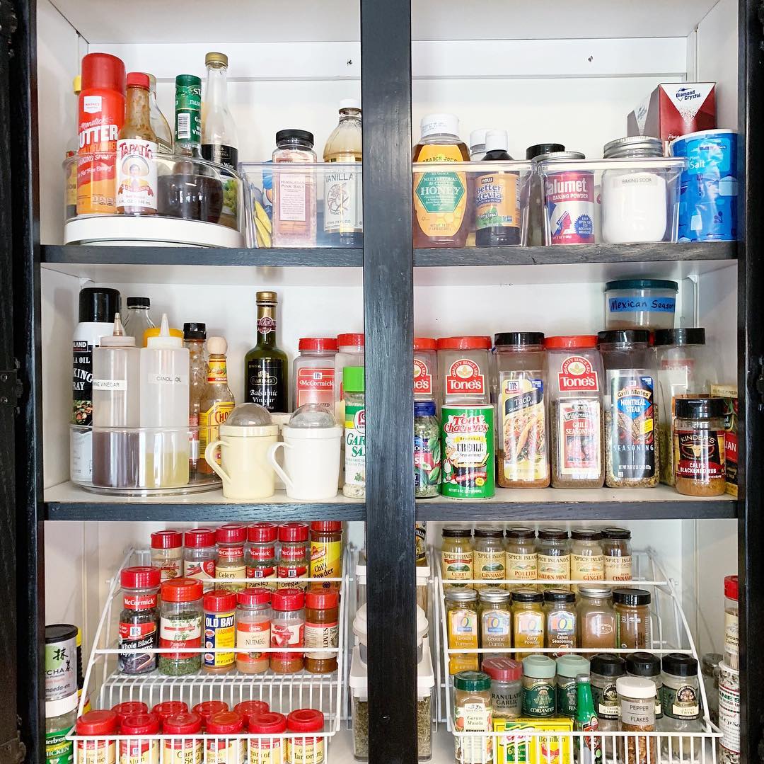 32. the Magnetic Spice Jars and Pull-out Drawer Fusion In a Warm Wooden Cabinet