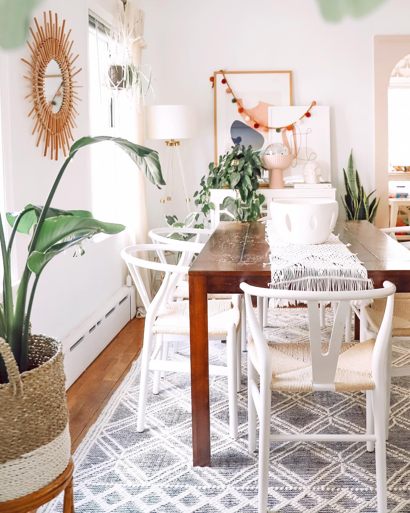 3. Moonlit Garden Canopy: a Boho Dining Room with Hanging Plants and Starry Lights