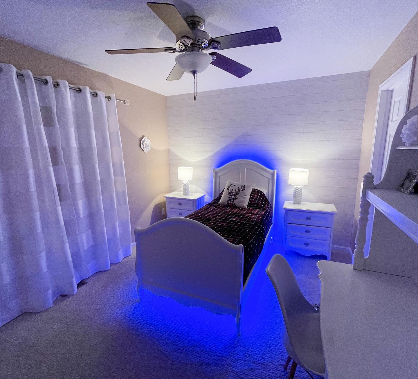 3. Skateboarder's Dream: Wall-mounted Deck and Industrial Lamps In Blue and Gray