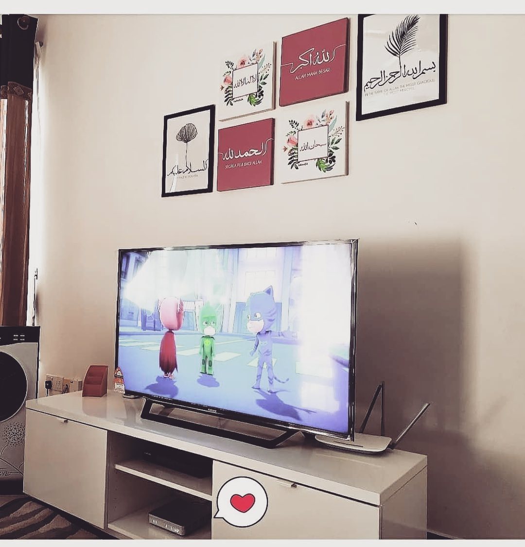 22. a Trio Of Wooden Boats Floating Above the Television