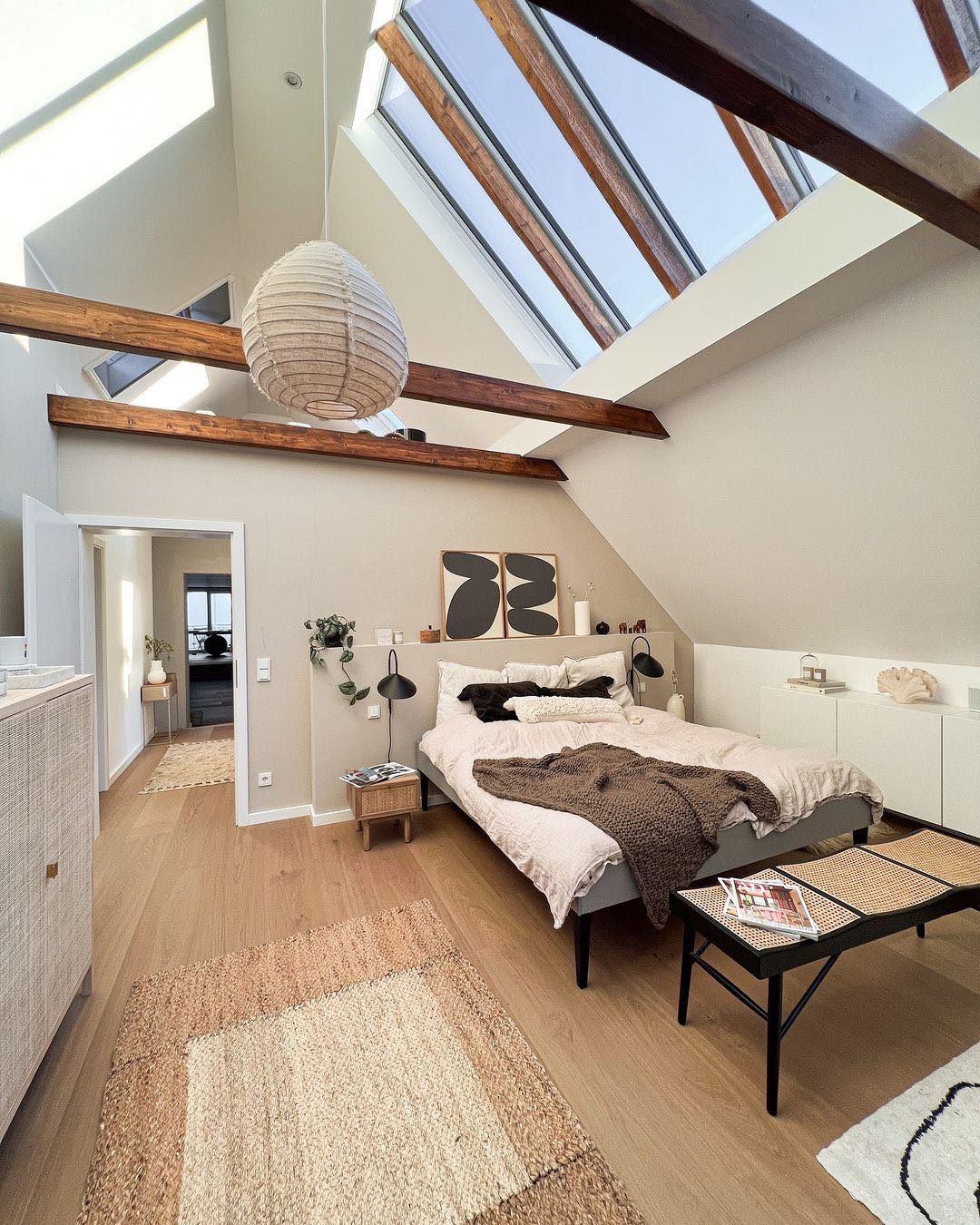 25. the Copper-piped Exposed Beam Loft with Vintage Suitcase Side Table