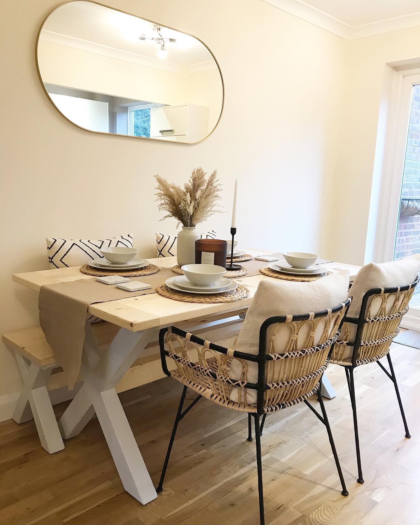 8. Woven Wicker Chandelier and Eclectic Plate Wall Boho Dining Room