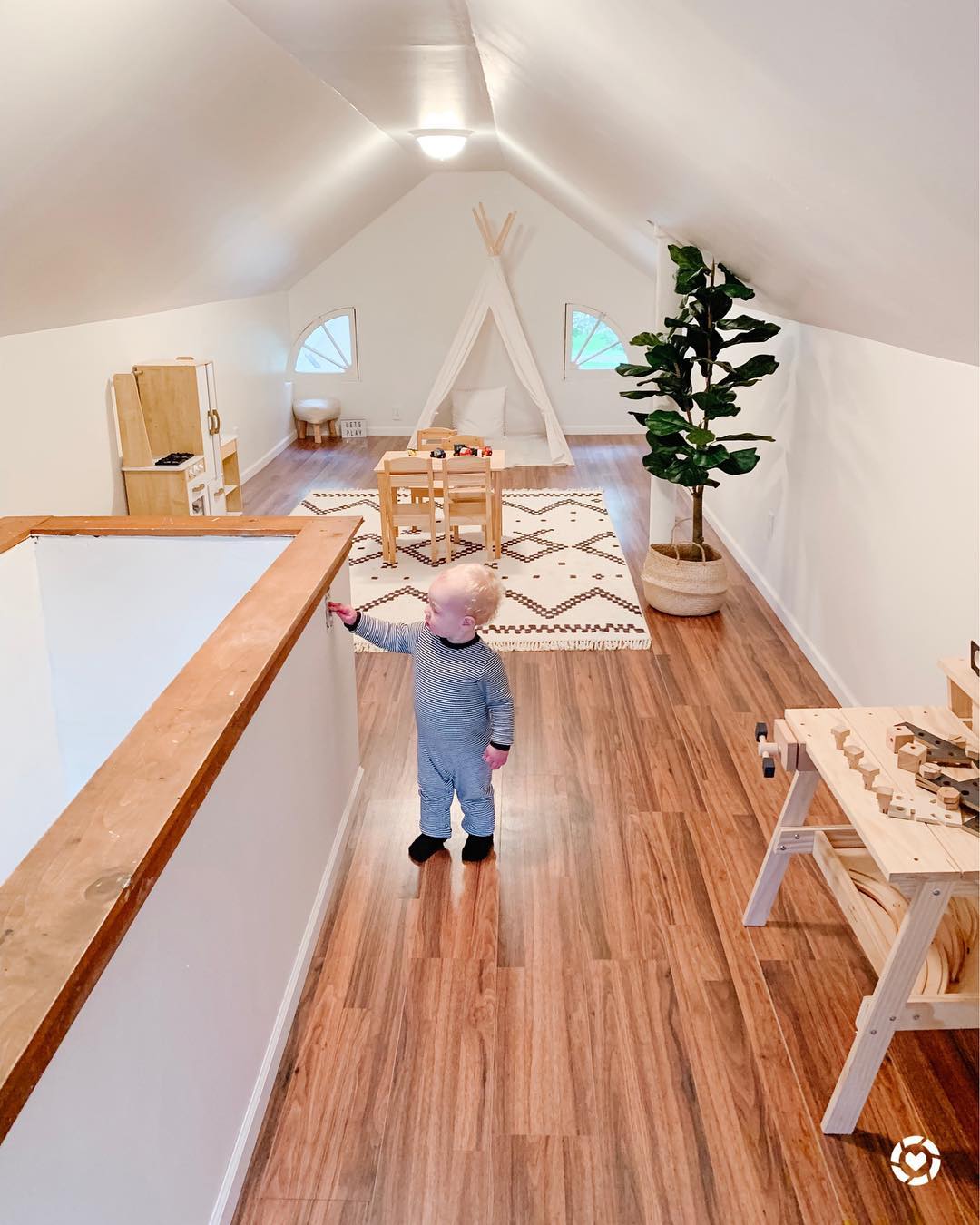 5. Vintage Suitcase Slide Into Imagination: a Playful Attic Nook