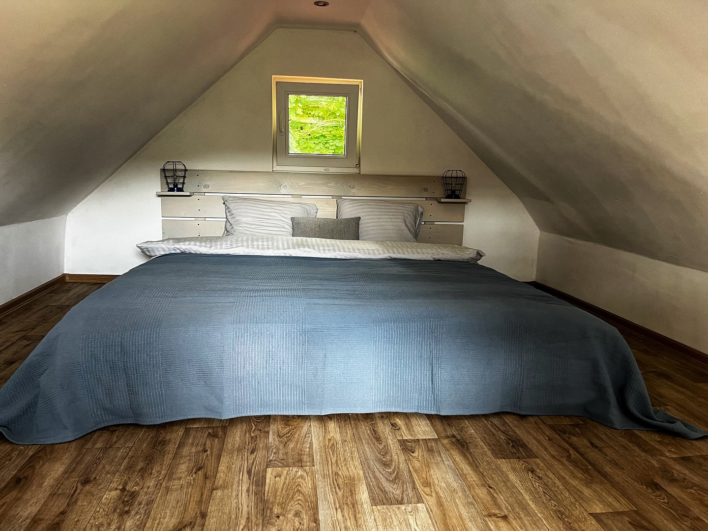 10. the Cobalt Canopy: a Loft Bed with Navy Blue Drapes Overlooking a Chessboard Floor
