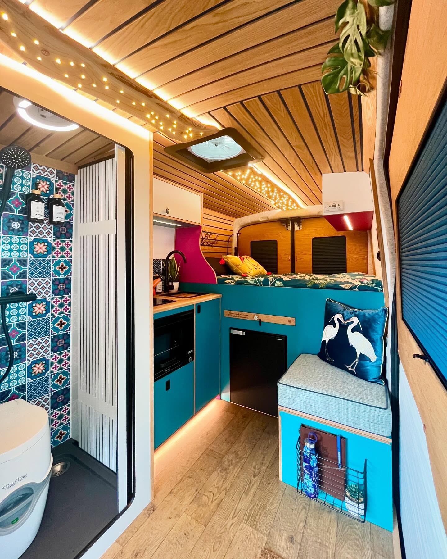 17. Tiny Camper Transformed Into a Cozy Nook with a Woven Tapestry Wall