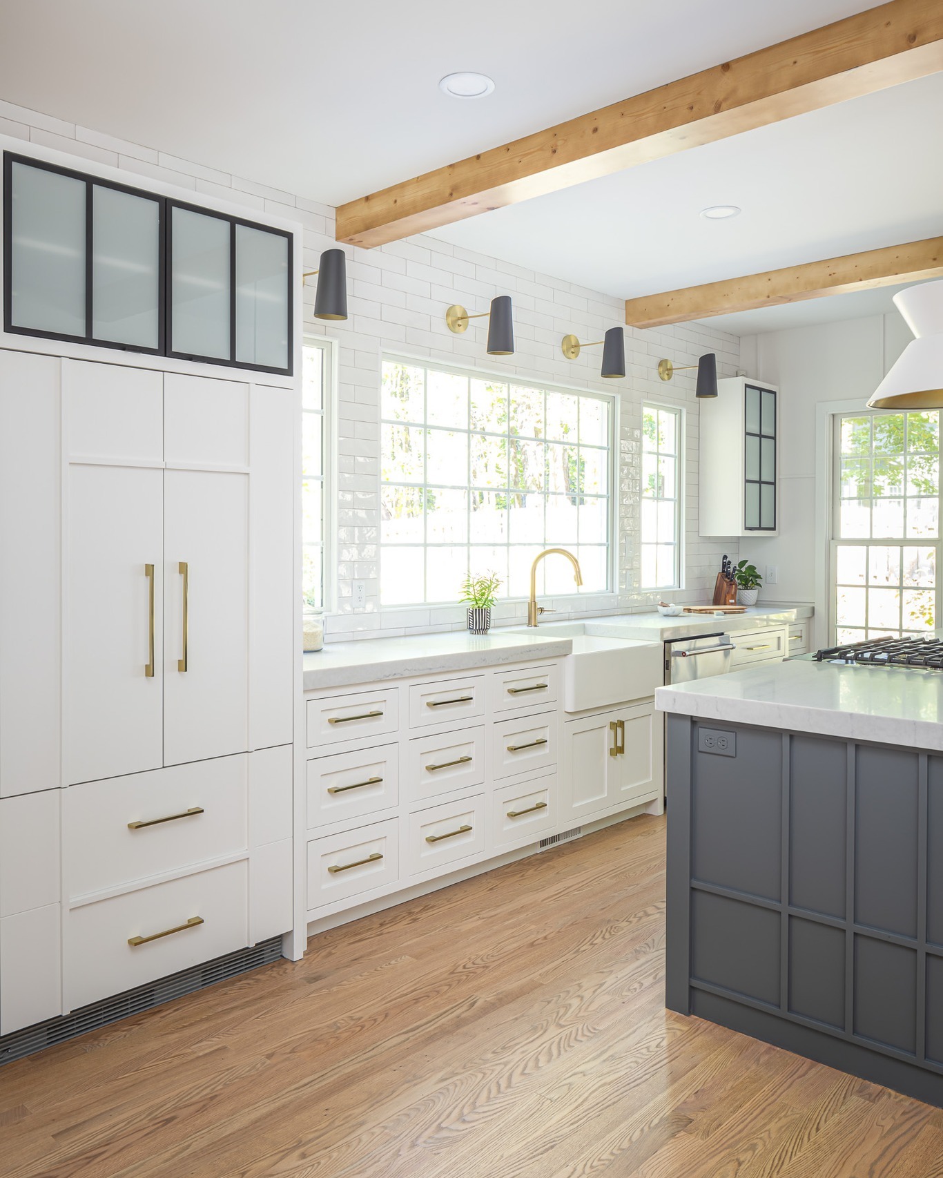 23. Mid Century Maple Wood Cabinets with Teal Retro Appliances and Checkerboard Floor