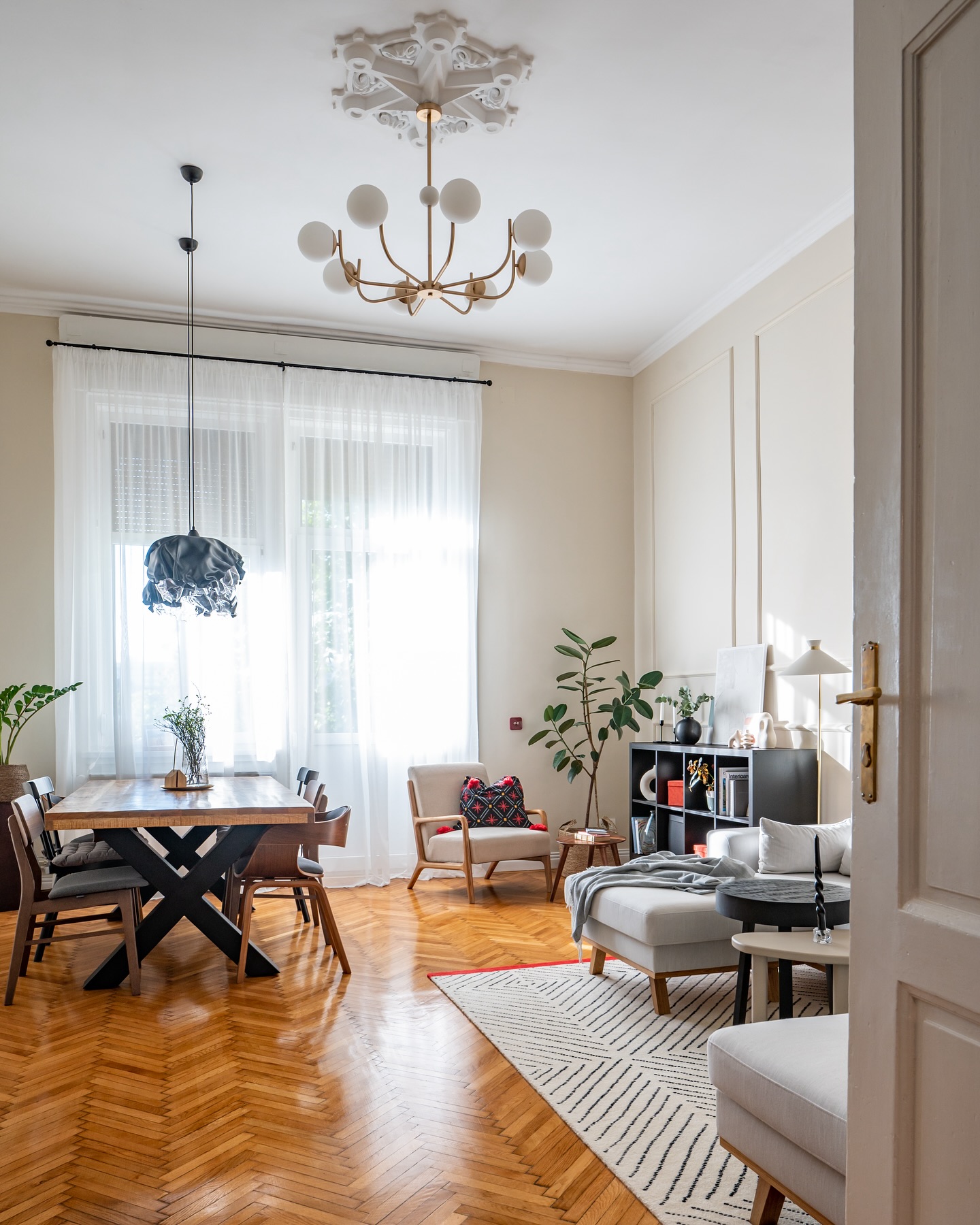 19. High Ceiling Haven with a Woven Basket Light and Exposed Brick Wall