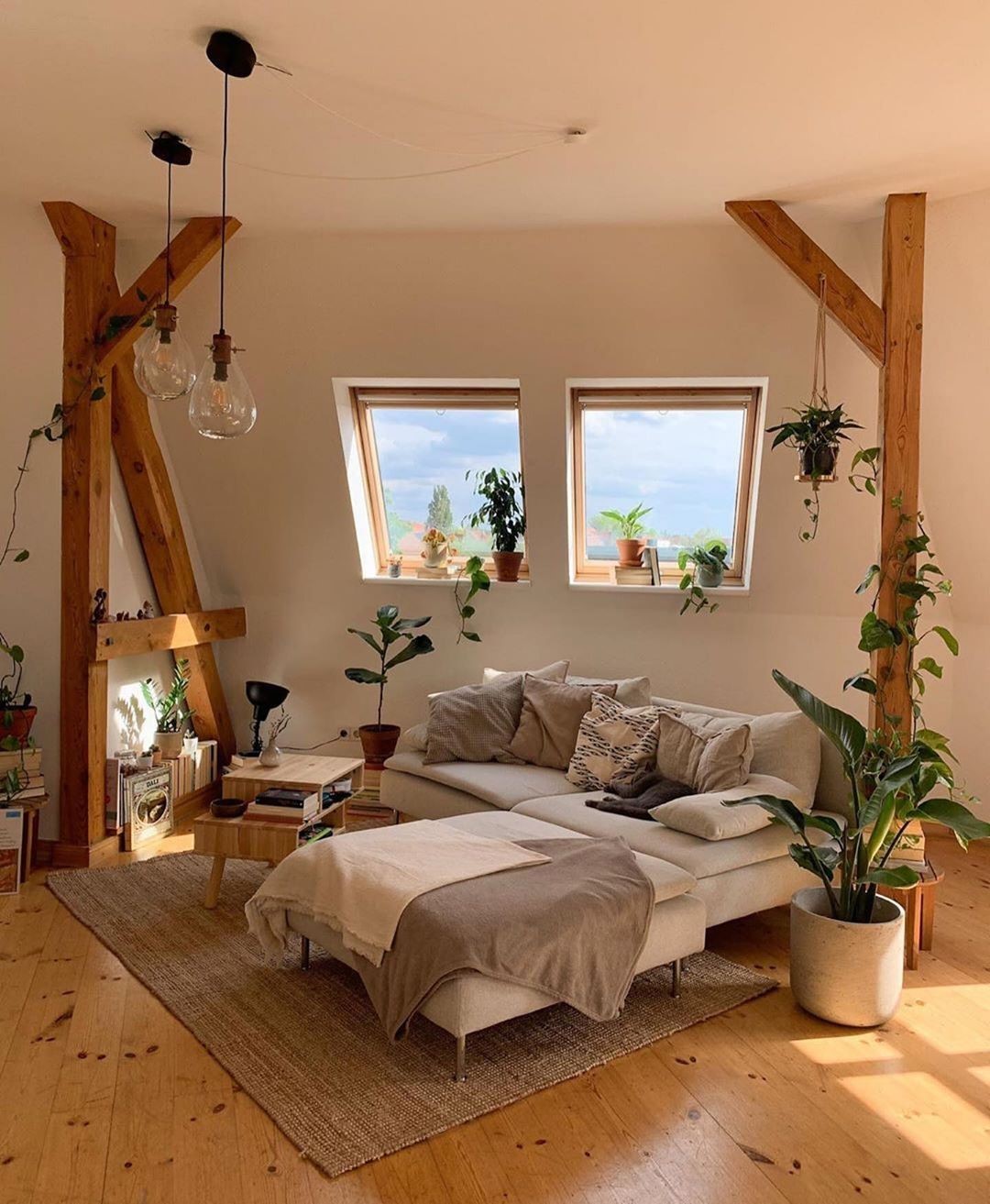 2. a Tapestry Of Time: Vintage Trunk and Exposed Beams In Attic Living