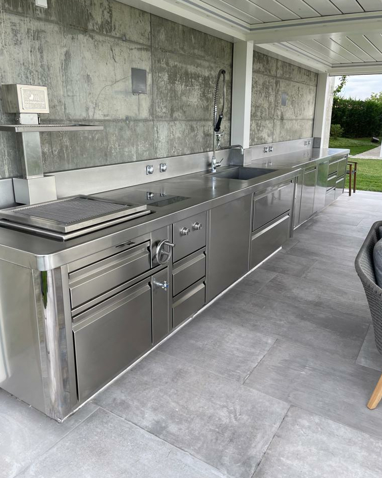 5. the Rustic Charm Of a Pallet Wood Countertop and Brick Oven Setup