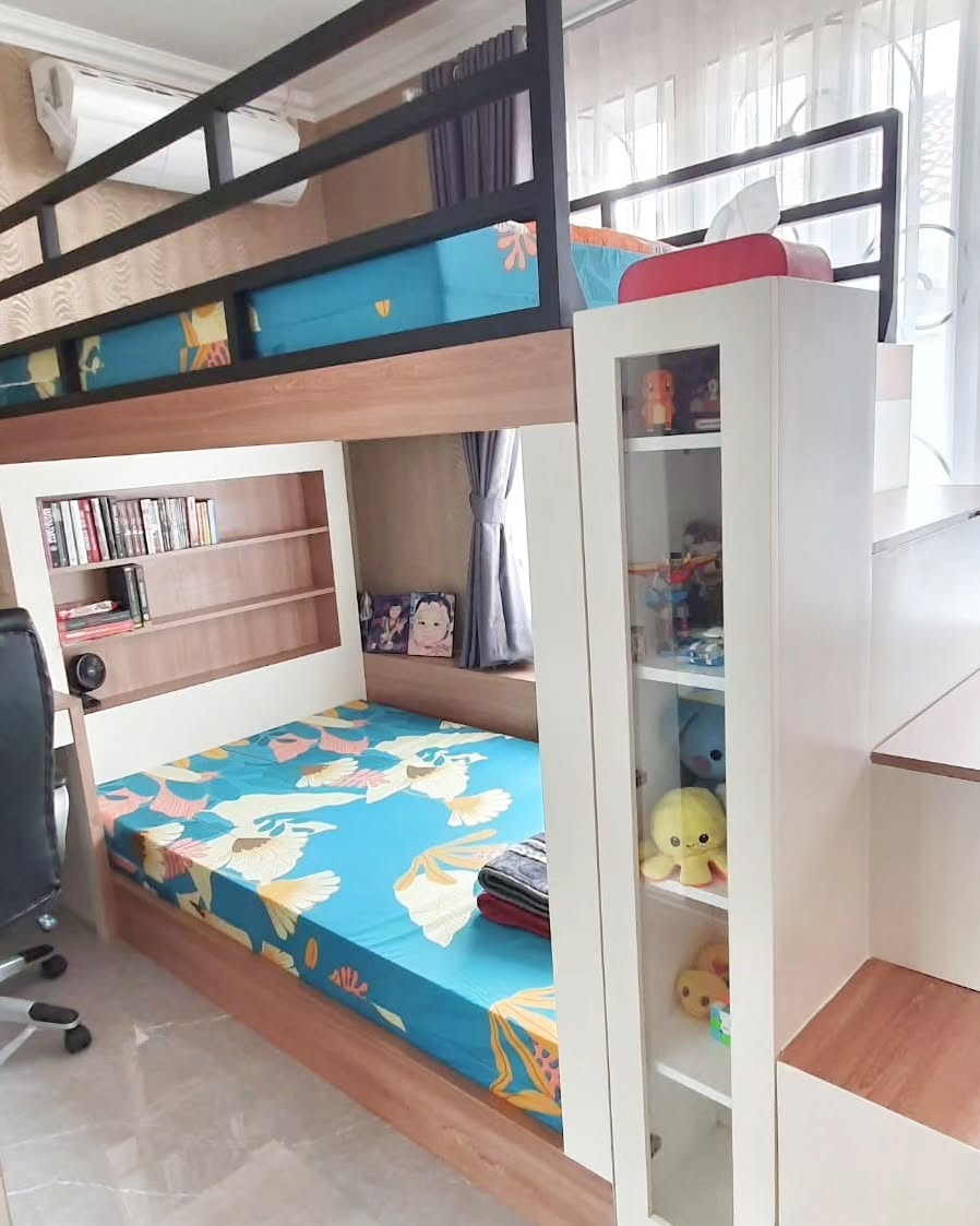 4. Loft Bed with Geometric Patterned Curtains and Industrial Lighting In a Cozy Nook