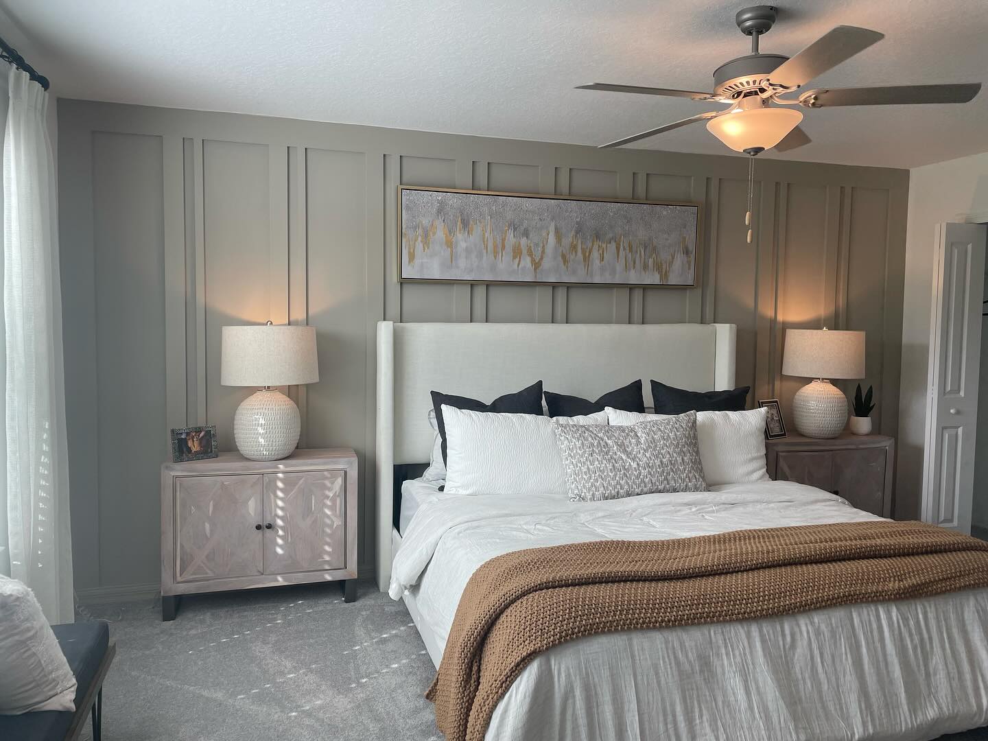 4. Woven Rattan Panels with Soft Pastel Accents Against a Warm Beige Wall