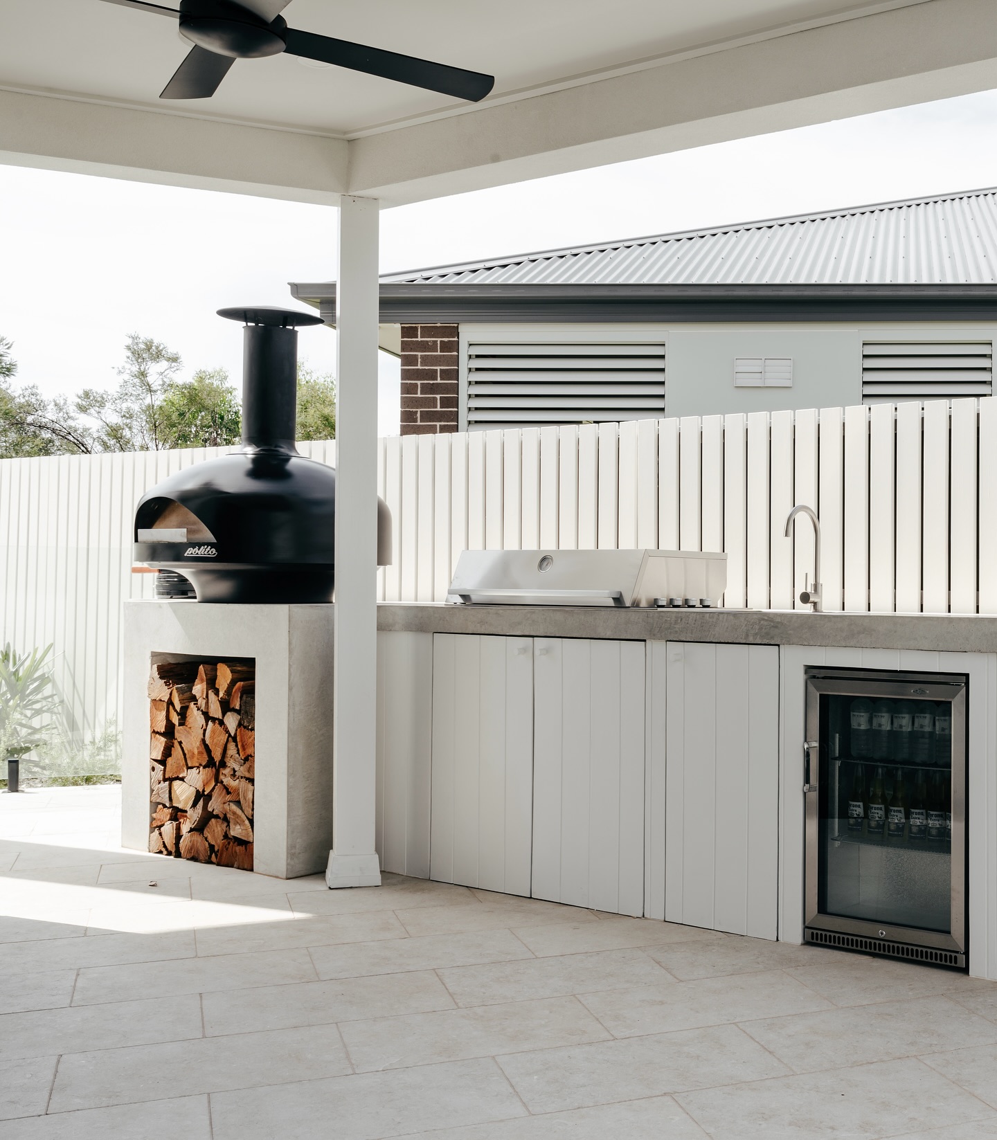13. the Sun-dappled Pergola with Recycled Pallet Countertop and Herb Garden Accents