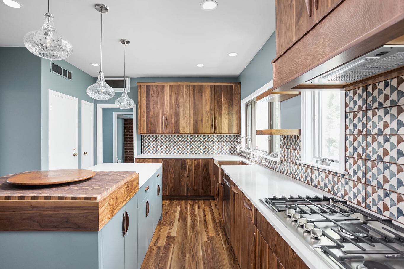 17. Vintage Brass Accents Meet Geometric Terrazzo In a Retro Kitchen Nook