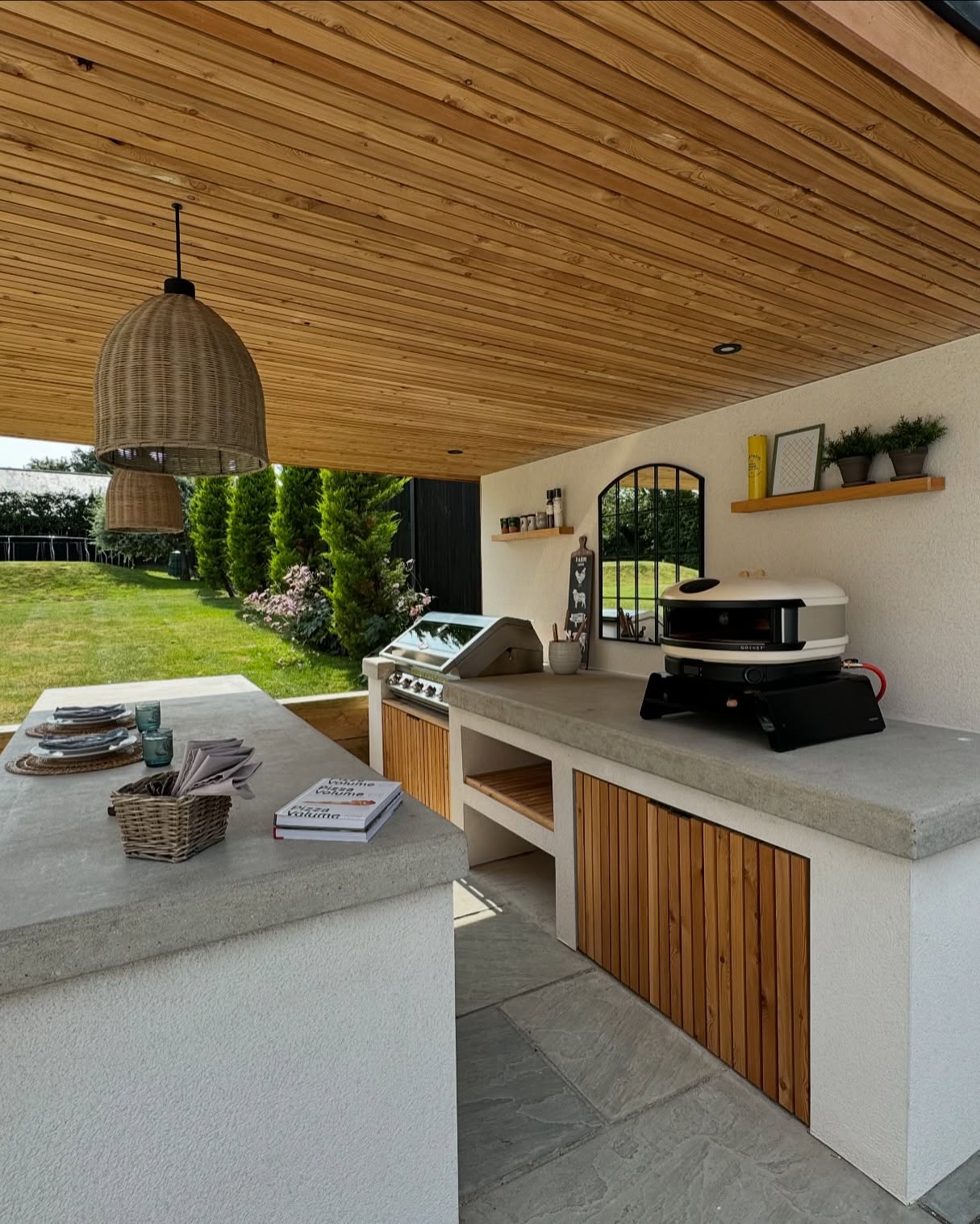 1. Vibrant Green Wall with Mosaic Tiled Counter and Compact Stainless Steel Grill