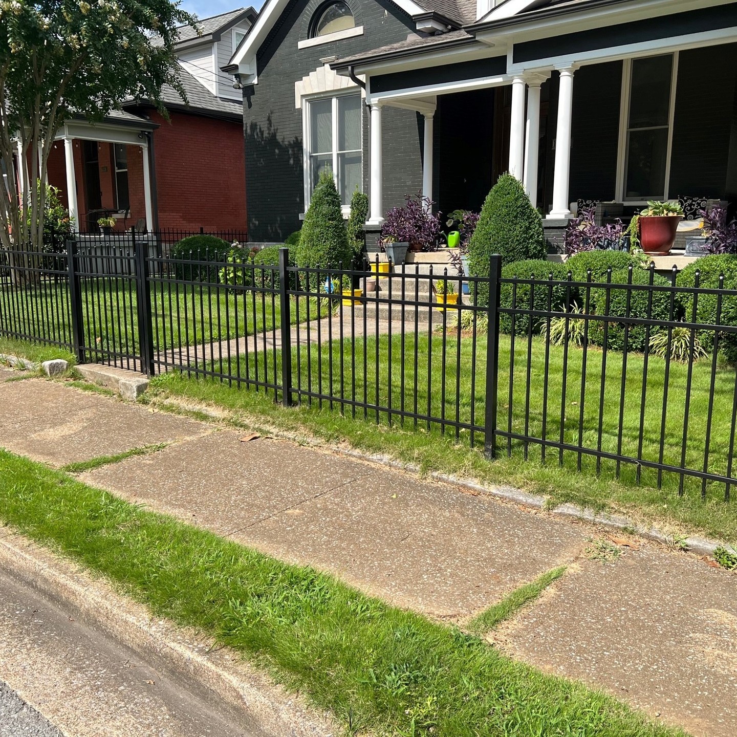 16. Low Fence with Interwoven Branches and Rustic Charm