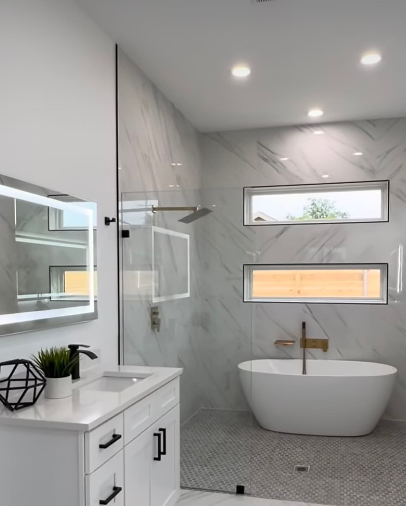 10. Moonlit Mosaic Marvel: a Tub and Shower Combo with Starry Night Tiles