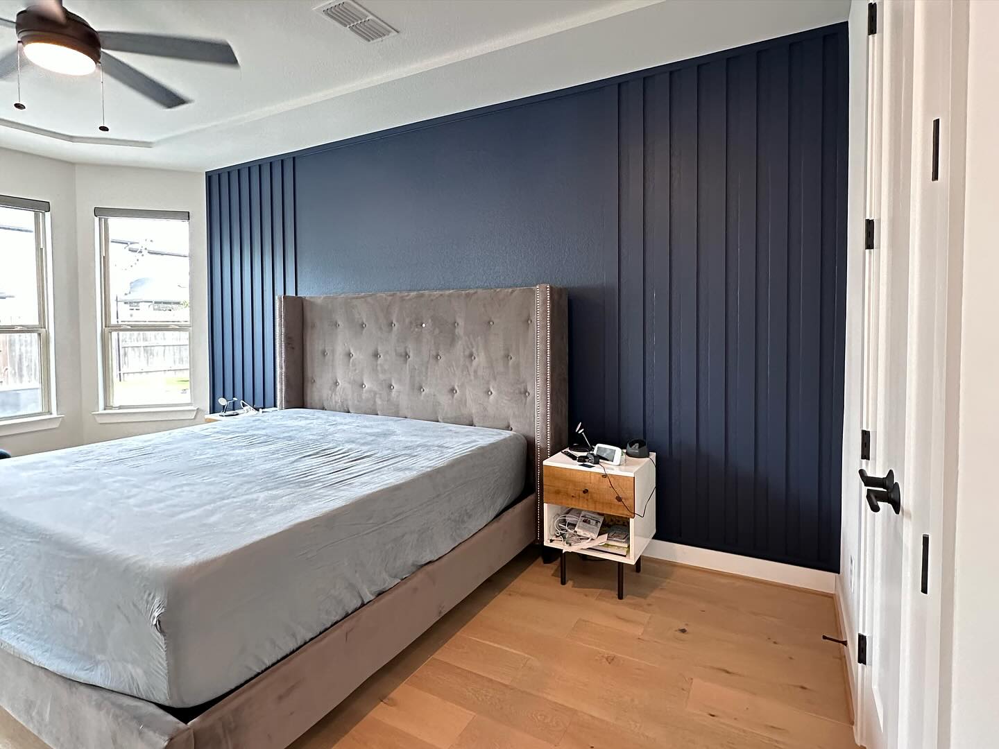 22. Cobalt Waves and Geometric Dreams: a Bedroom Accent Wall with Angular Accents