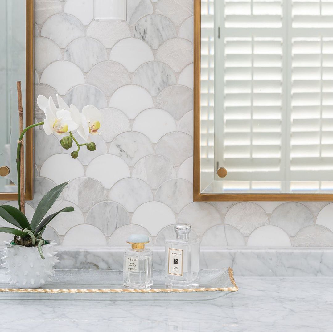 4. Moonlit Marble Mosaic: a Celestial Backsplash with Brass Accents
