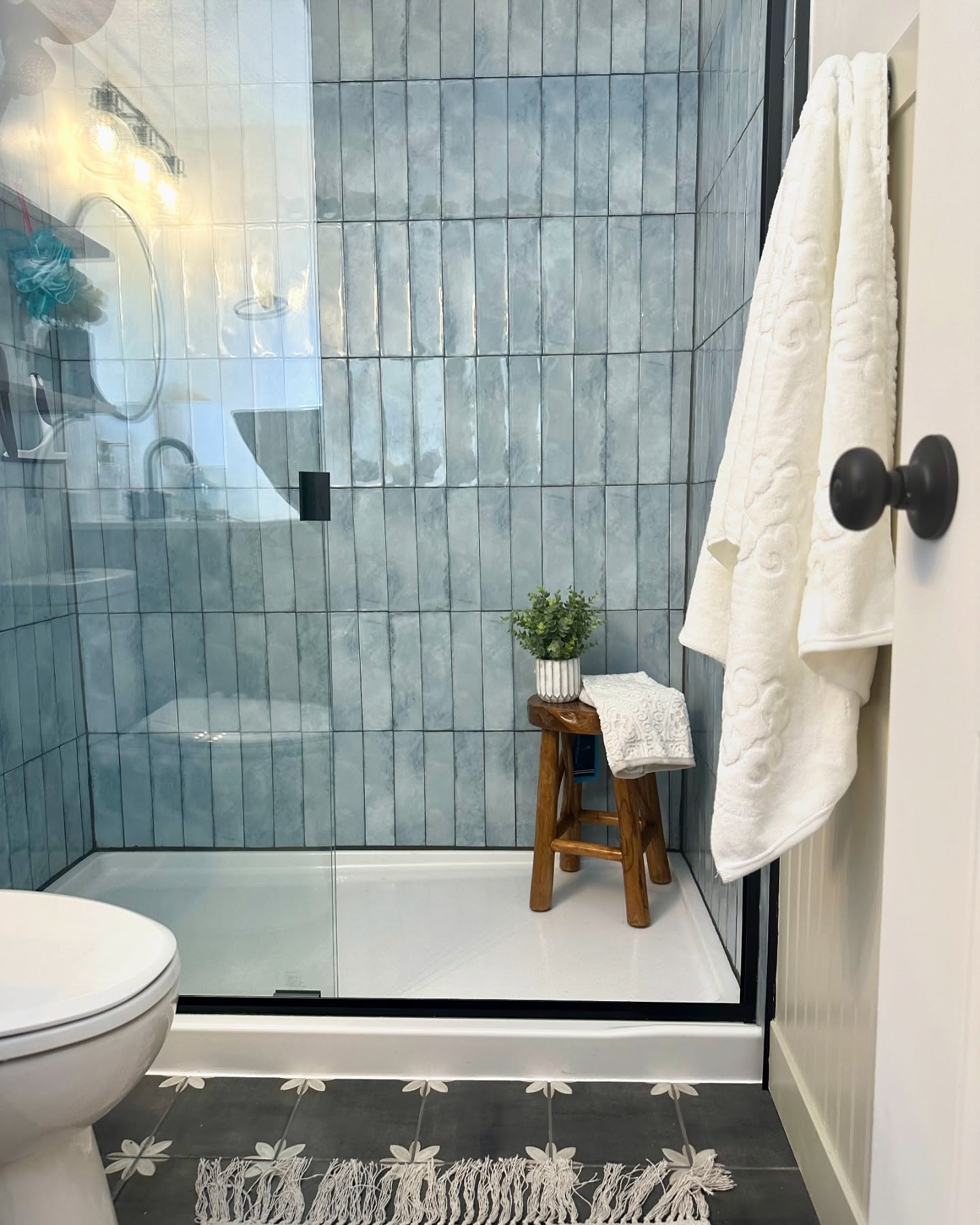 28. the Cascade Of Light: a Walk-in Shower with a Skylight Window and River Rock Floor