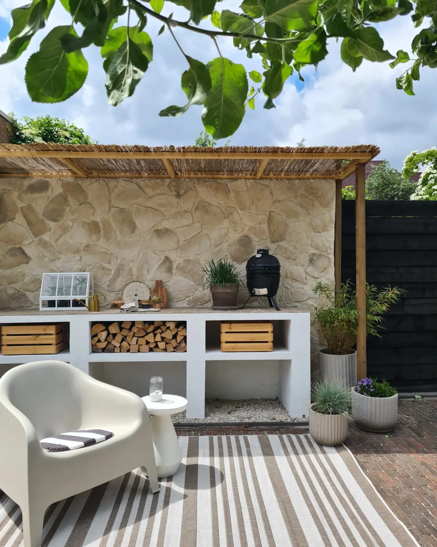 19. a Rustic Charm with a Pallet Wood Pizza Oven and String Lights
