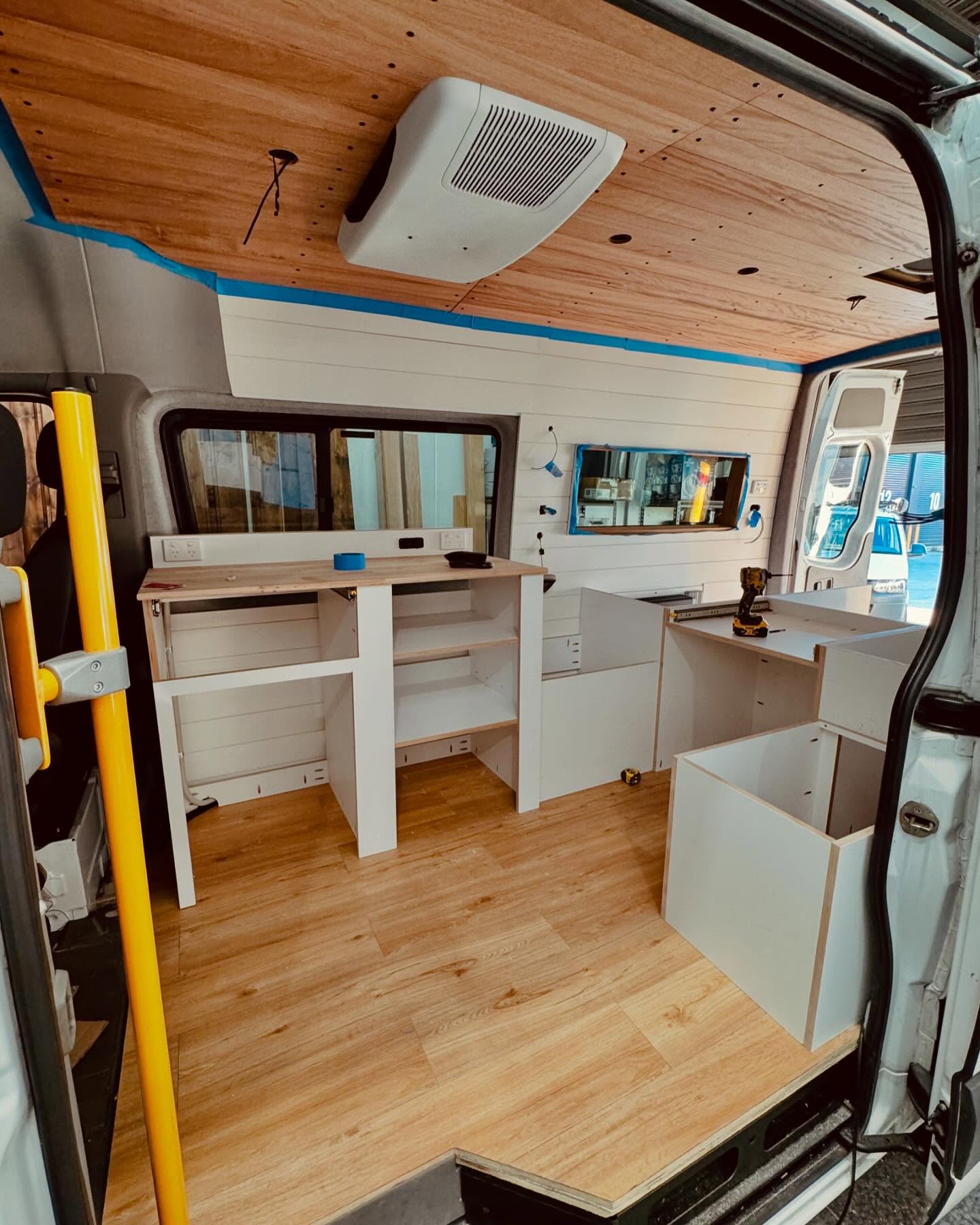 8. a Cozy Nook with a Retro Twist: Orange Cushions and Vintage Radio Charm