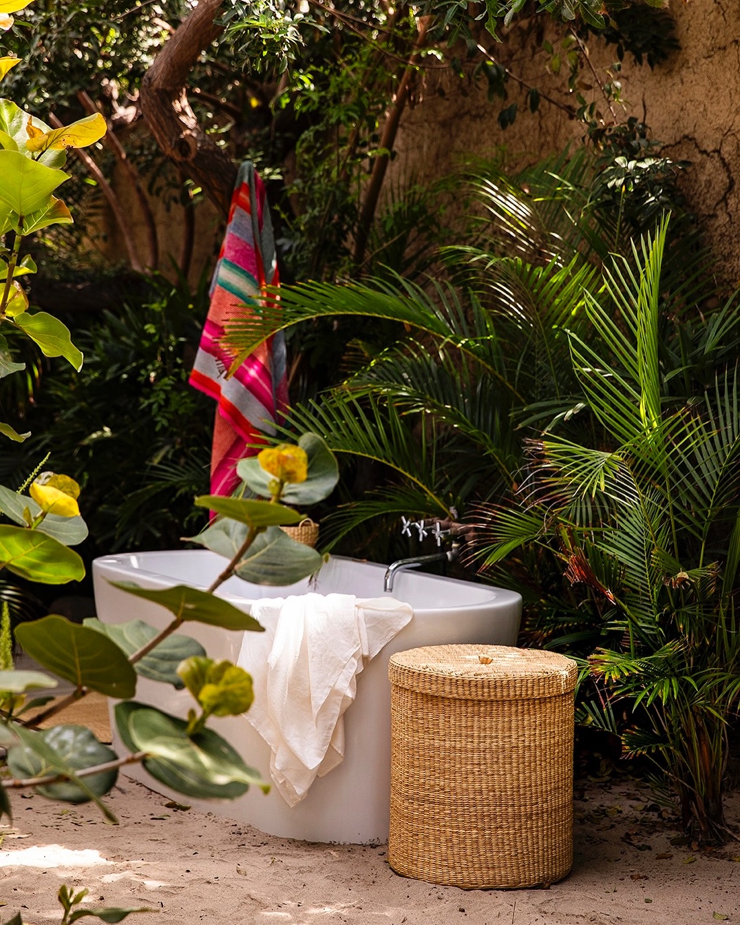 7. the Woven Willow Basket with Teal Towel Accent