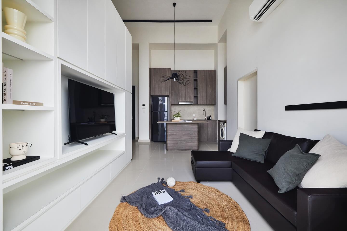 11. High Ceiling Haven with Suspended Wooden Walkway and Industrial Chandelier