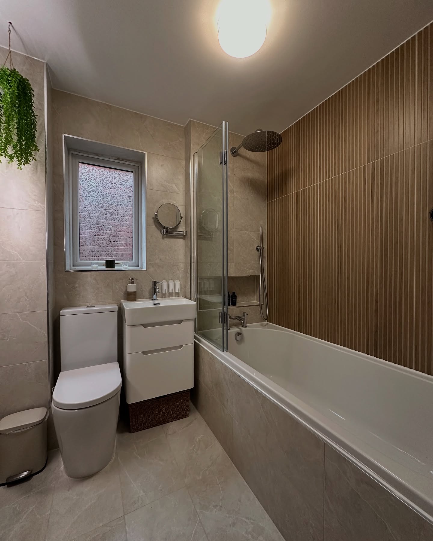 1. Frosted Glass Partition with Copper Accents and Geometric Tile Mosaic