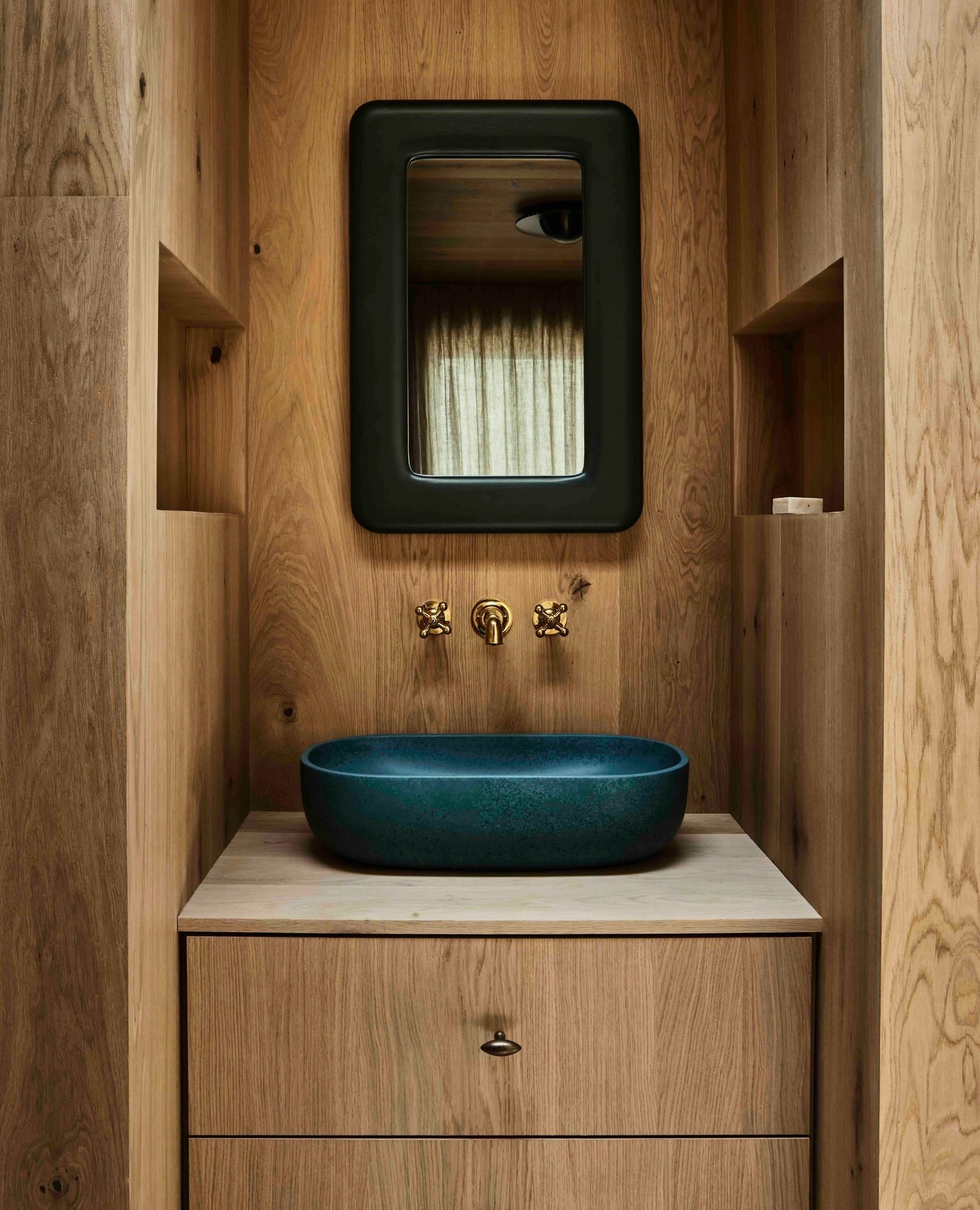 8. the Antique Gold Mirror Reflecting the Intricate Lace Curtain and Porcelain Sink Ensemble