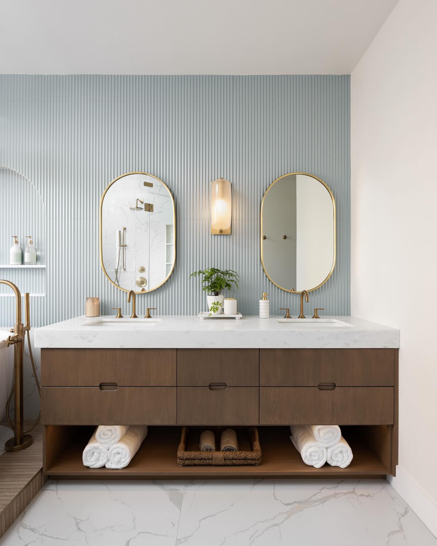 9. Seafoam Green Glass and Marble Mosaic: a Coastal Retreat In Your Bathroom