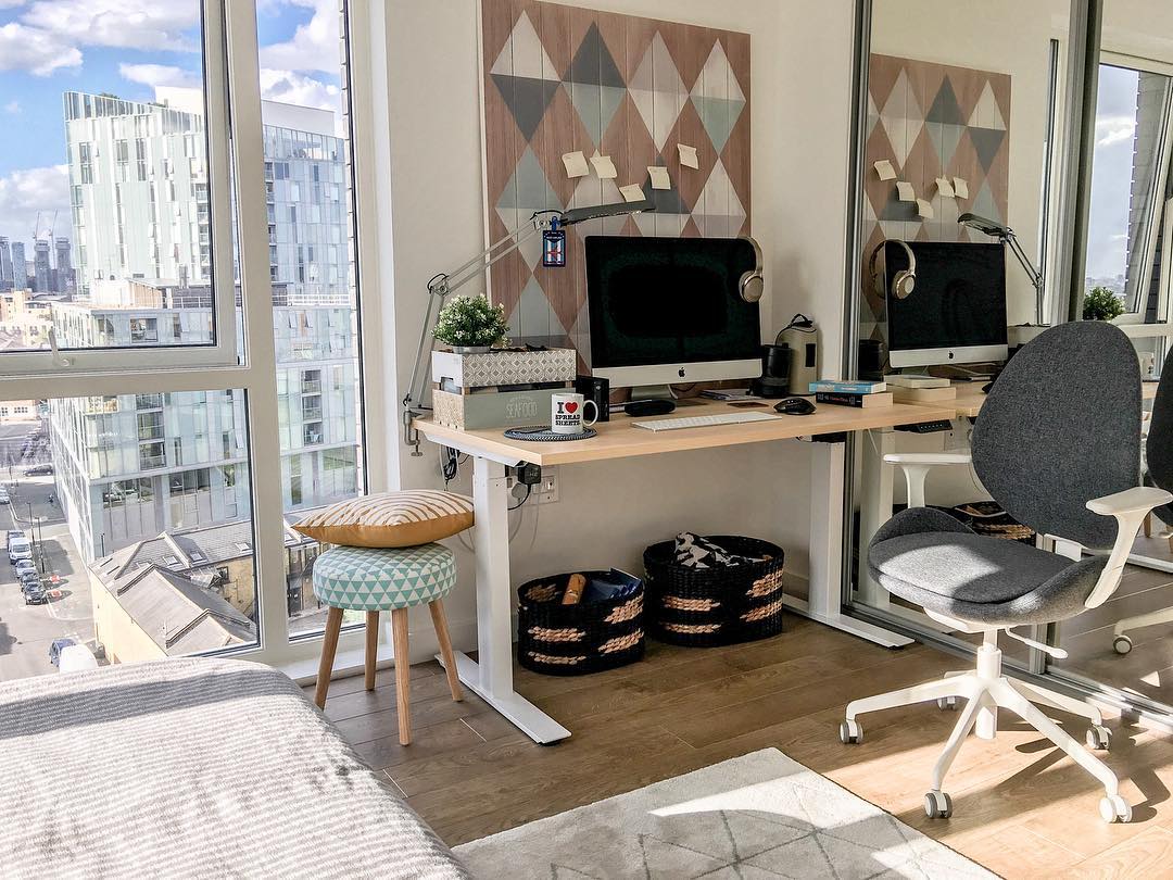 10. Neon Glow Workspace: a Bedside Desk Illuminated by a Pink Led Strip Light