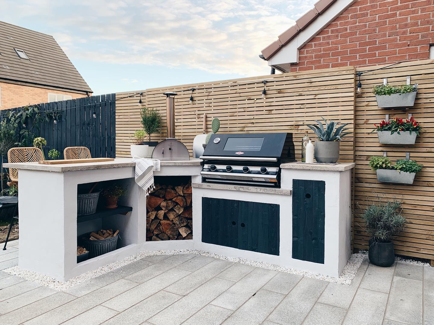 8. Sunflower Yellow Tiles and Cobalt Blue Accents Define This Compact Outdoor Kitchen
