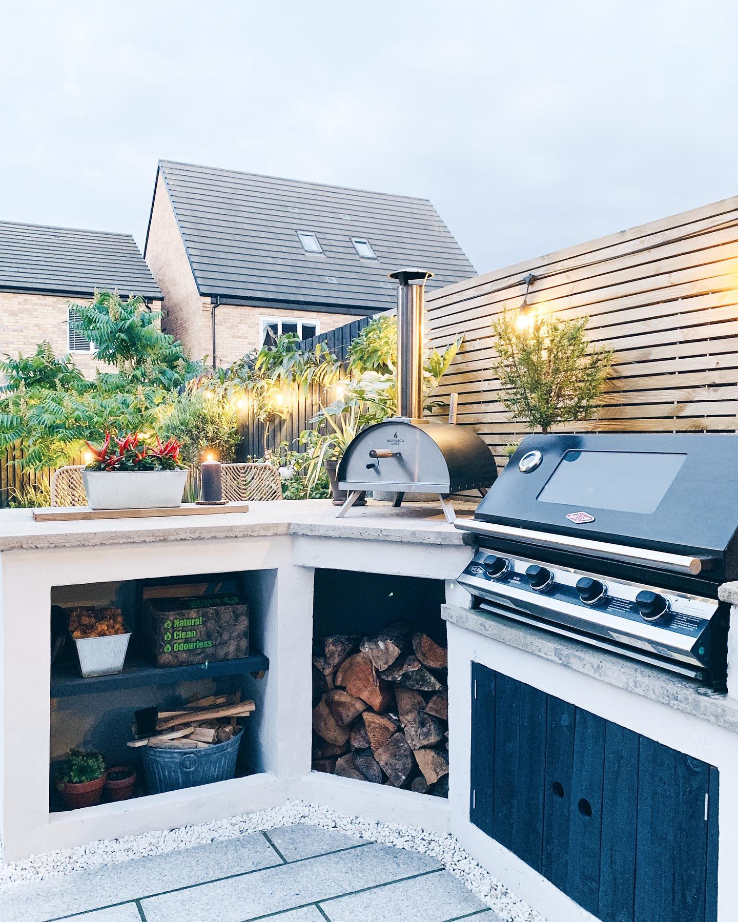 15. Rustic Pallet Countertop Meets Industrial Metal Sink In a Breezy Backyard Setting