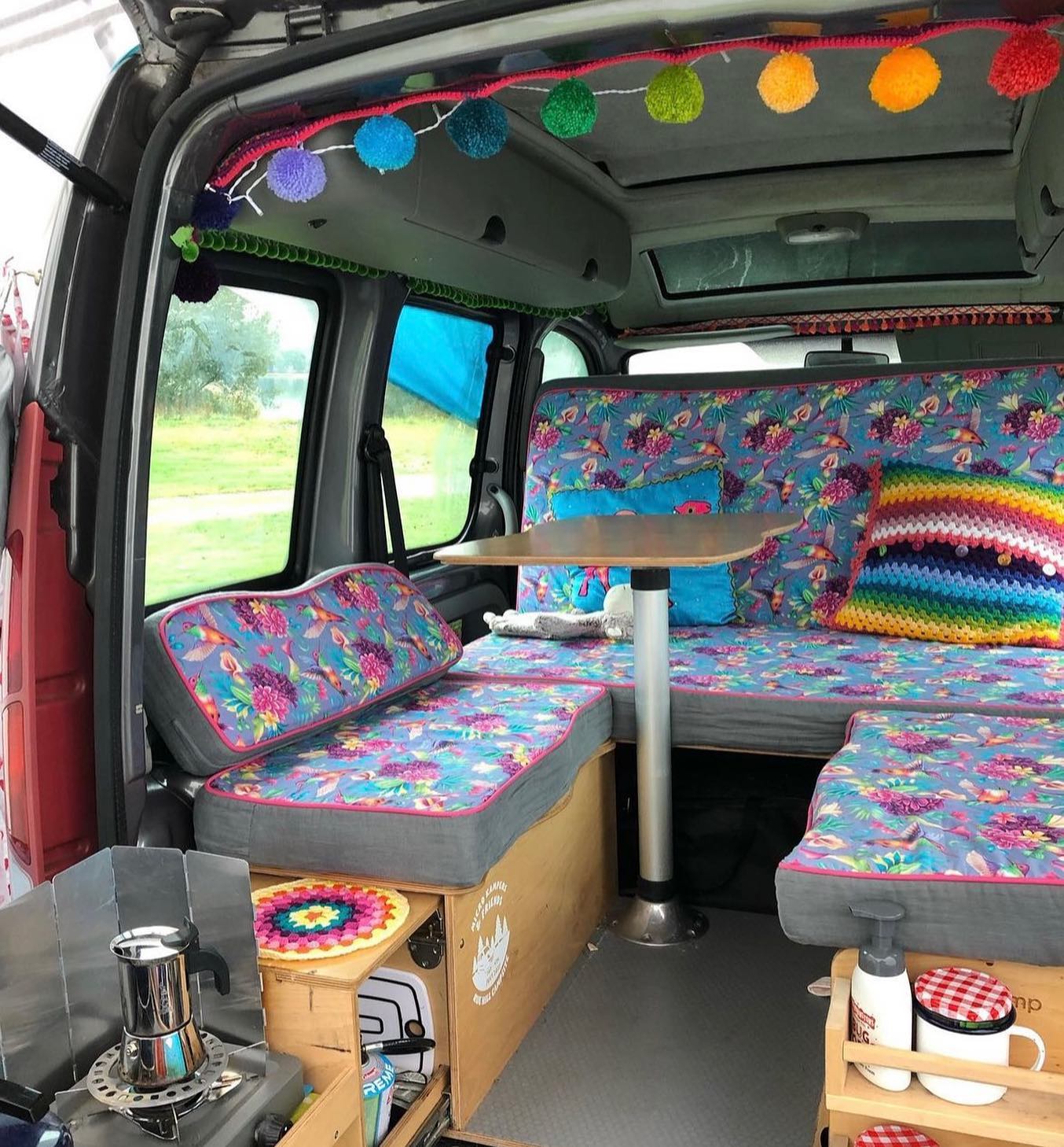 9. the Moroccan Lantern Glow Over a Compact Camper Kitchen Nook