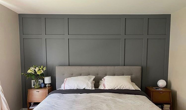 2. the Crimson Velvet Curtain Cascade Against Geometric Charcoal Wall