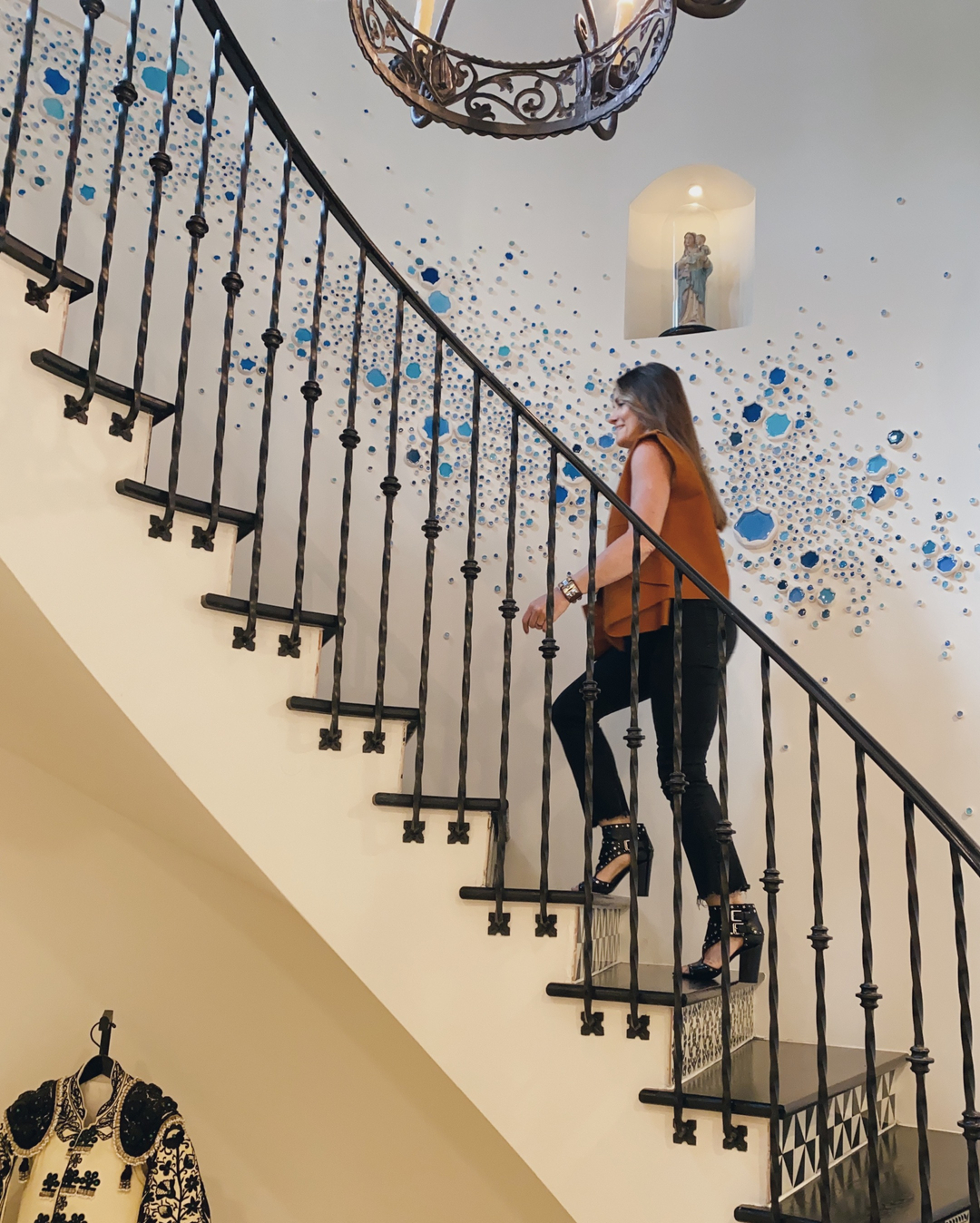 10. Cascading Ribbon Staircase with Geometric Shadows and Amber Glow