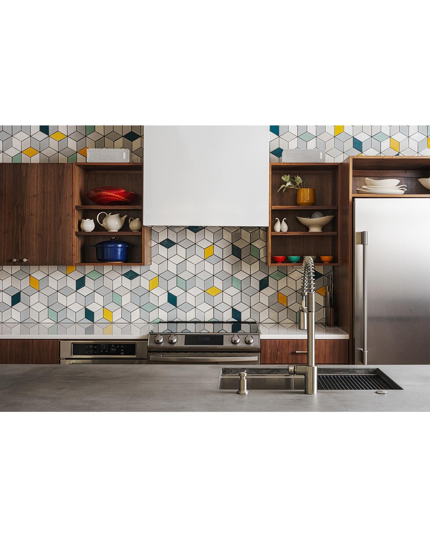 14. Mid Century Brass Hardware and Geometric Tile Fusion Kitchen