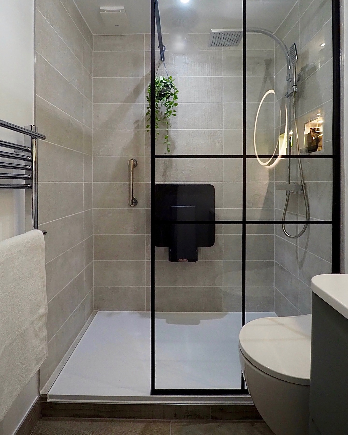 33. a Cascade Of Light: the Glass and Stone Walk-in Shower with a Sunlit Niche