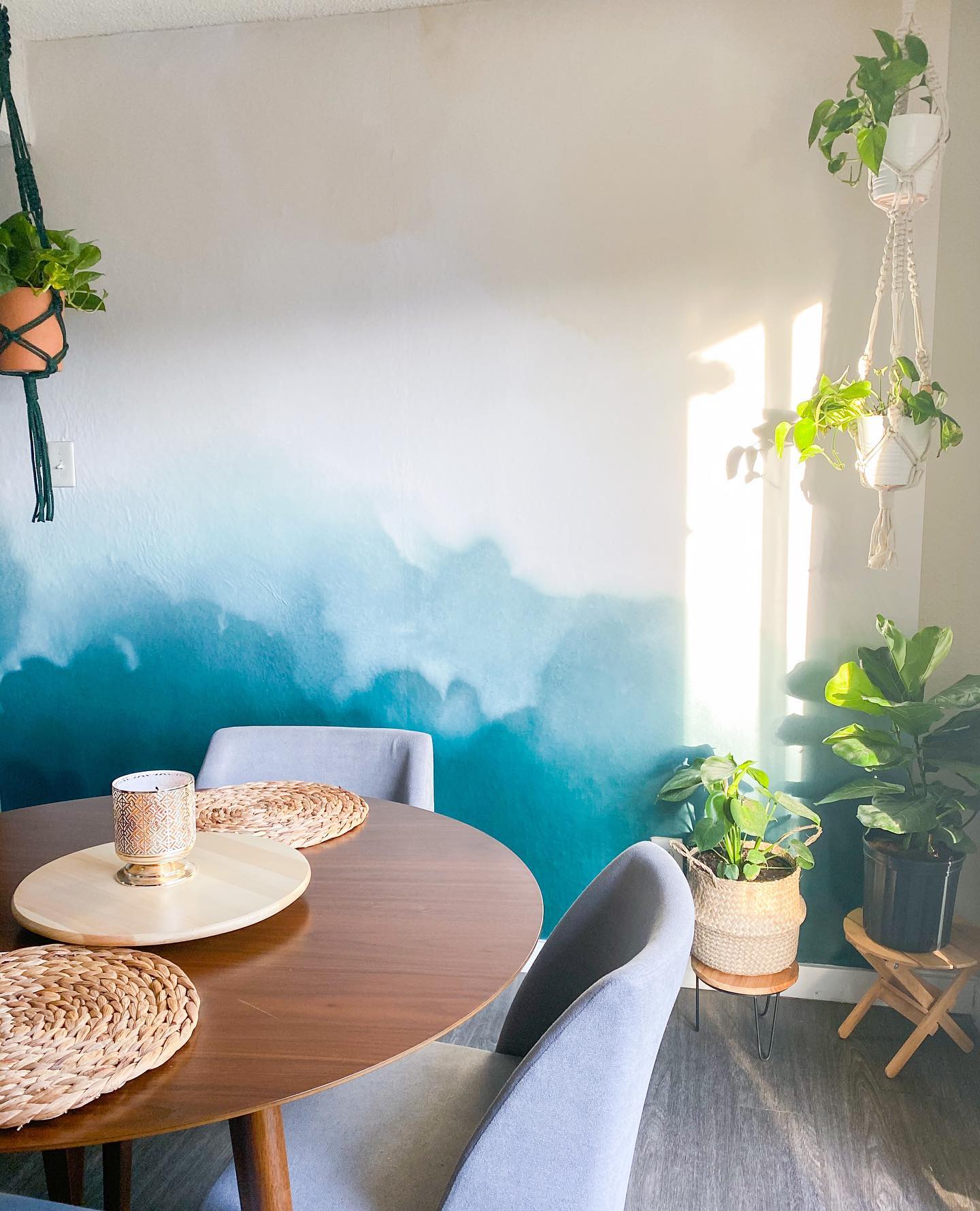 18. Boho Dining Room with Macrame Wall Hanging and Geometric Patterns