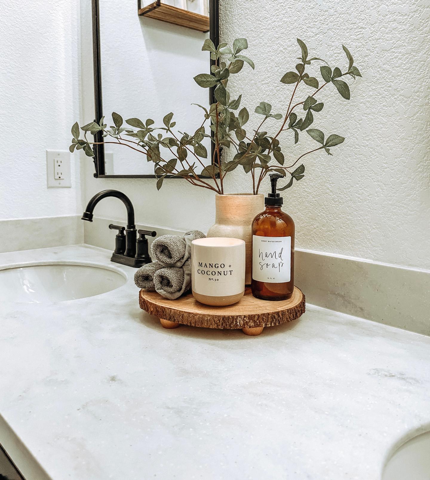 7. Moonlit Marble and Copper Serenity: a Bathroom Countertop with a Celestial Glow