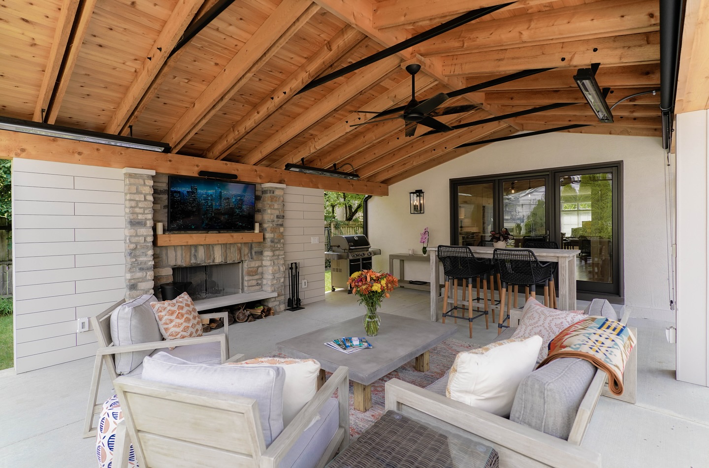 15. Crimson Vine Canopy: a Patio Transformation with Nature's Embrace