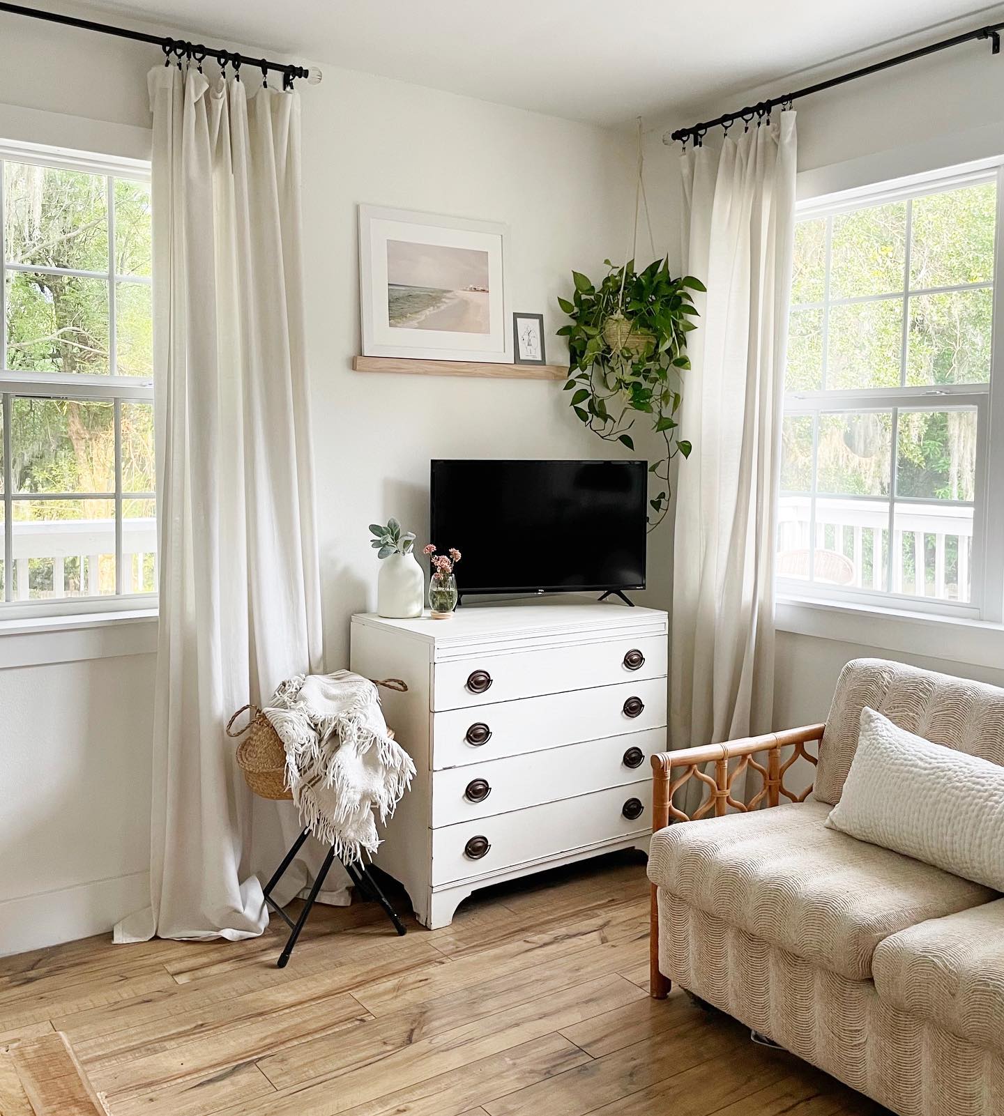 31. a Trio Of Teal Vases on a Dark Wood Mantel Overlooking a Tv