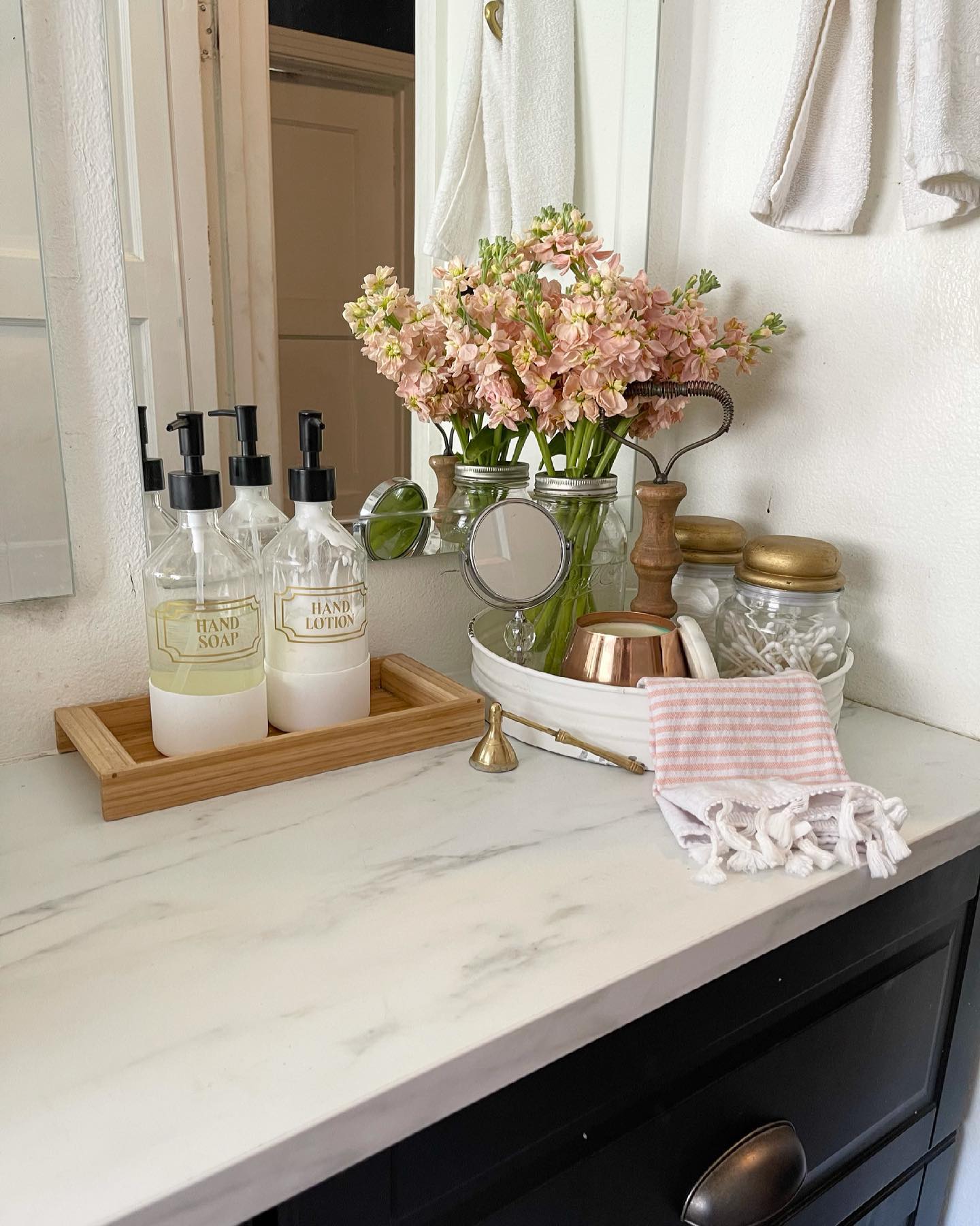 20. a Marble Oasis with a Copper Touch and Greenery Embrace