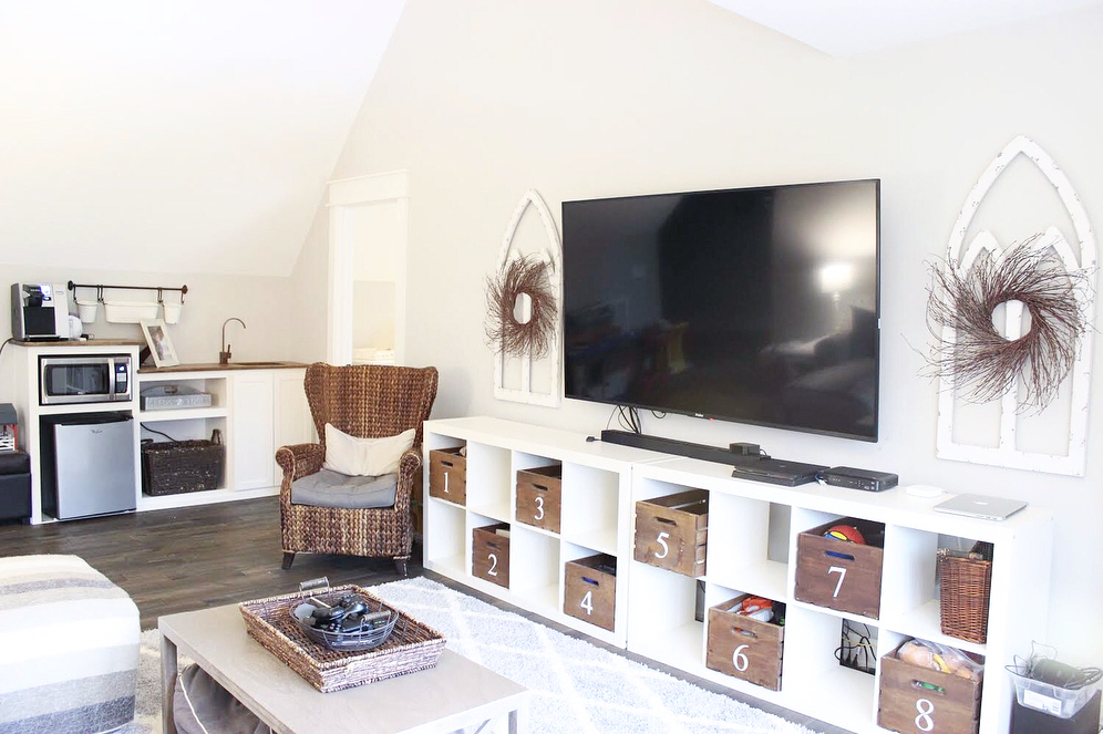6. Floating Shelves with a Touch Of Nature: a Wooden Canvas Above the Tv