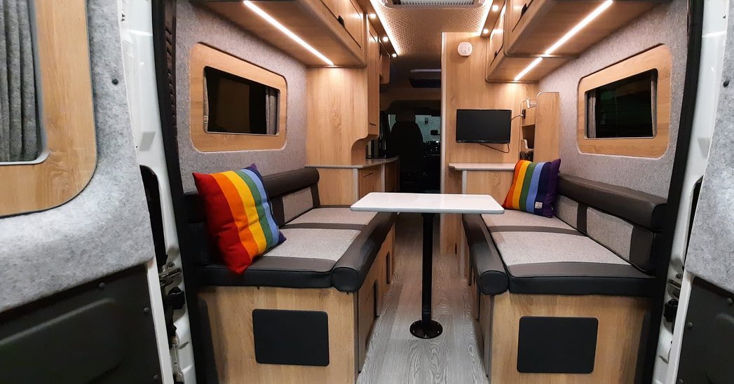 3. Moonlit Camper Nook with Starry Fairy Lights and Cozy Blankets