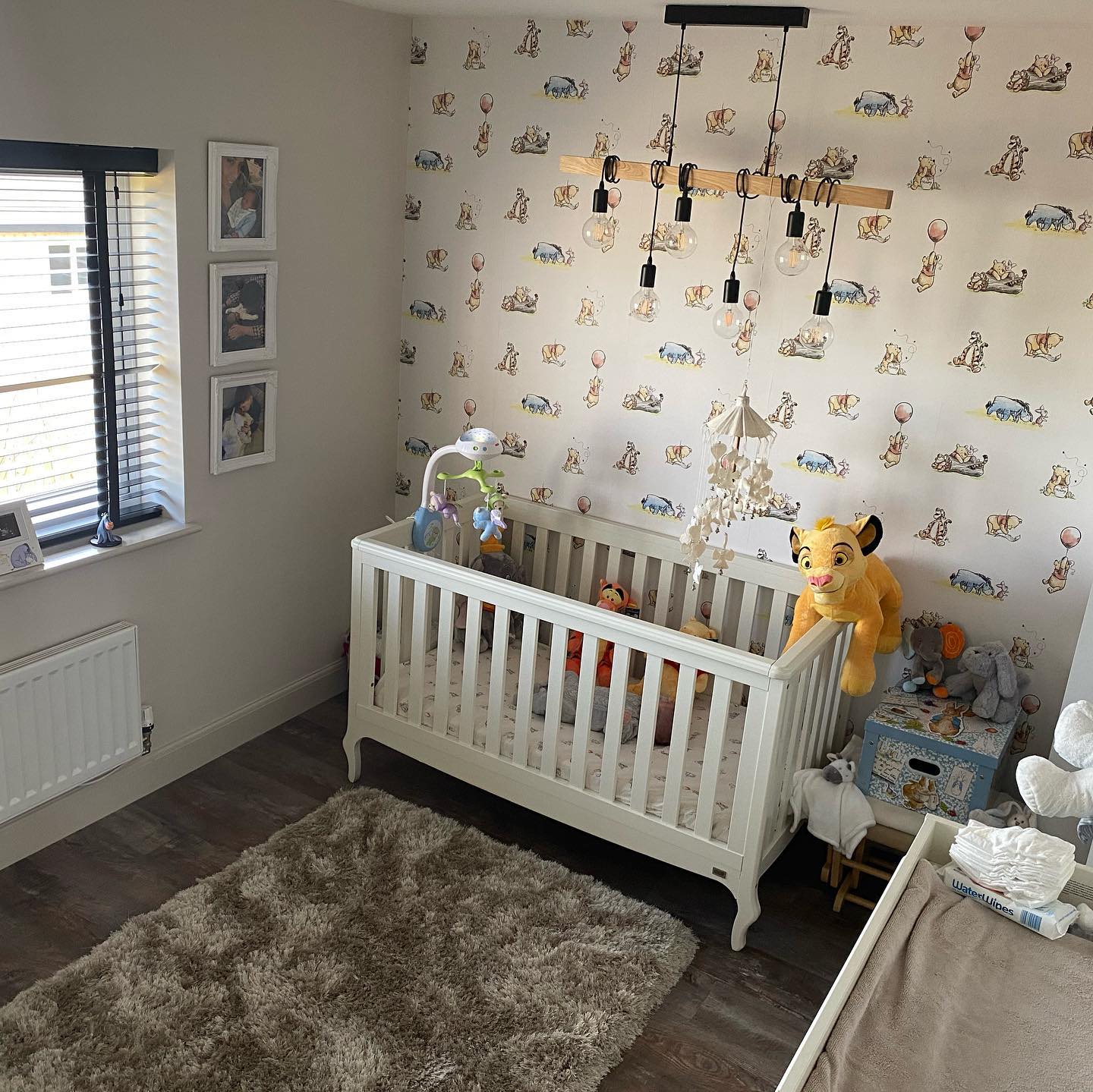 5. Whimsical Honey Pot Shelves and Pooh's Playful Pals Mural