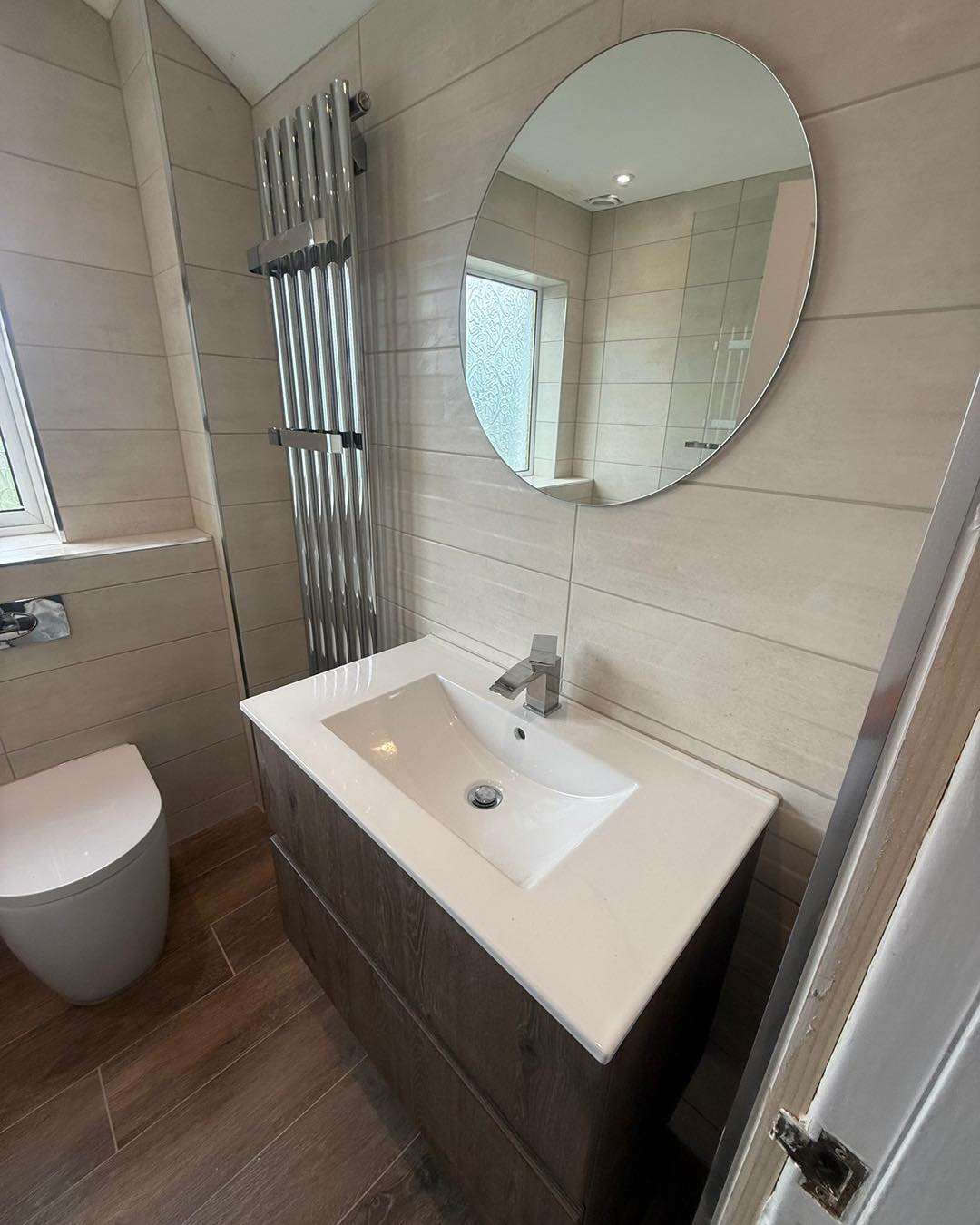 24. Geometric Tile Mosaic Meets Zen Serenity: a Bathroom Retreat